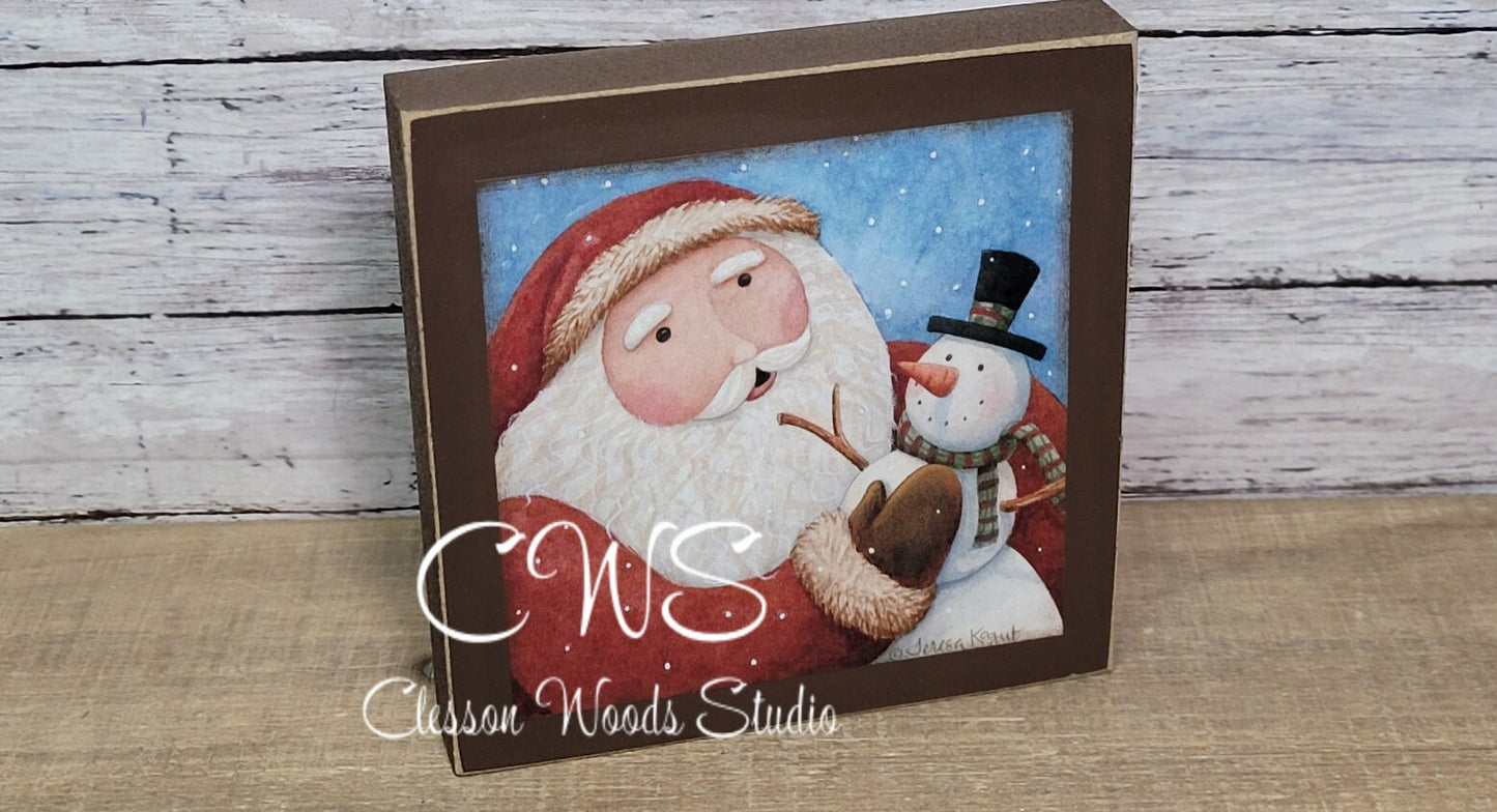 Santa Holding Snowman Square Wood Sign