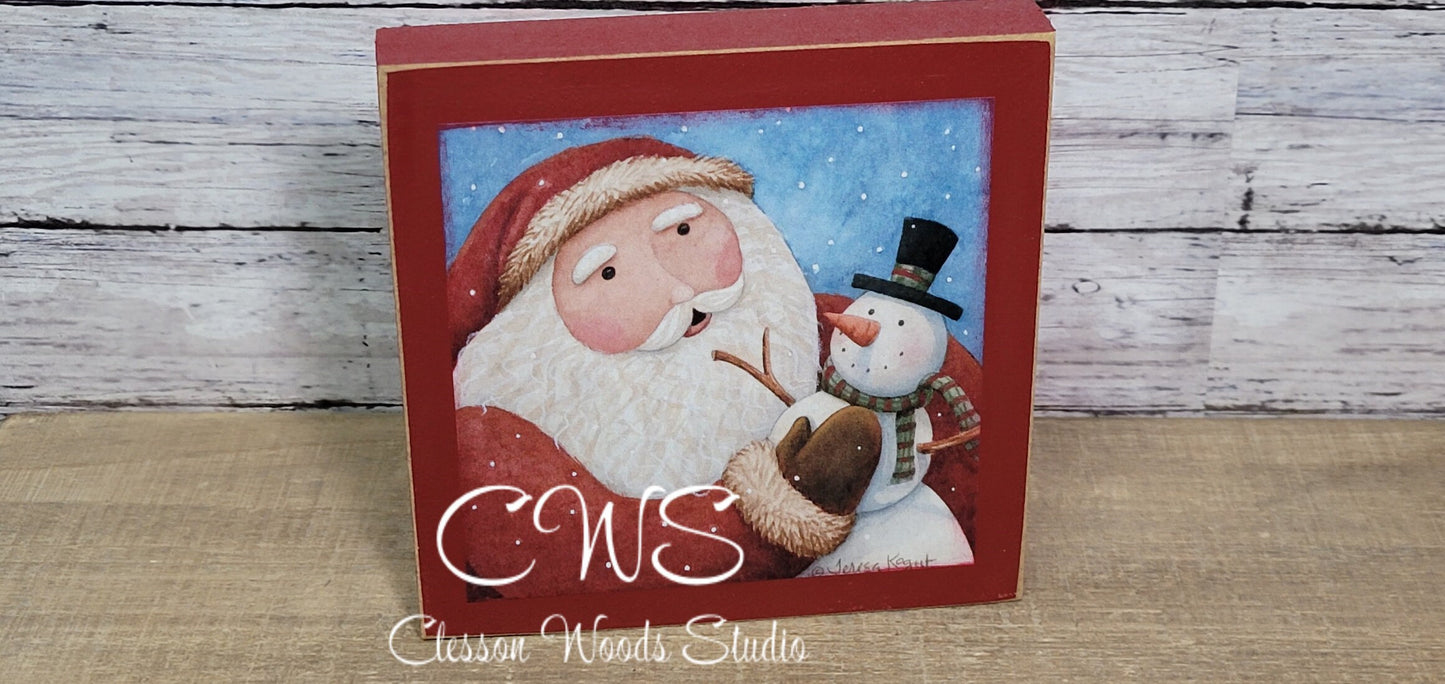 Santa Holding Snowman Square Wood Sign