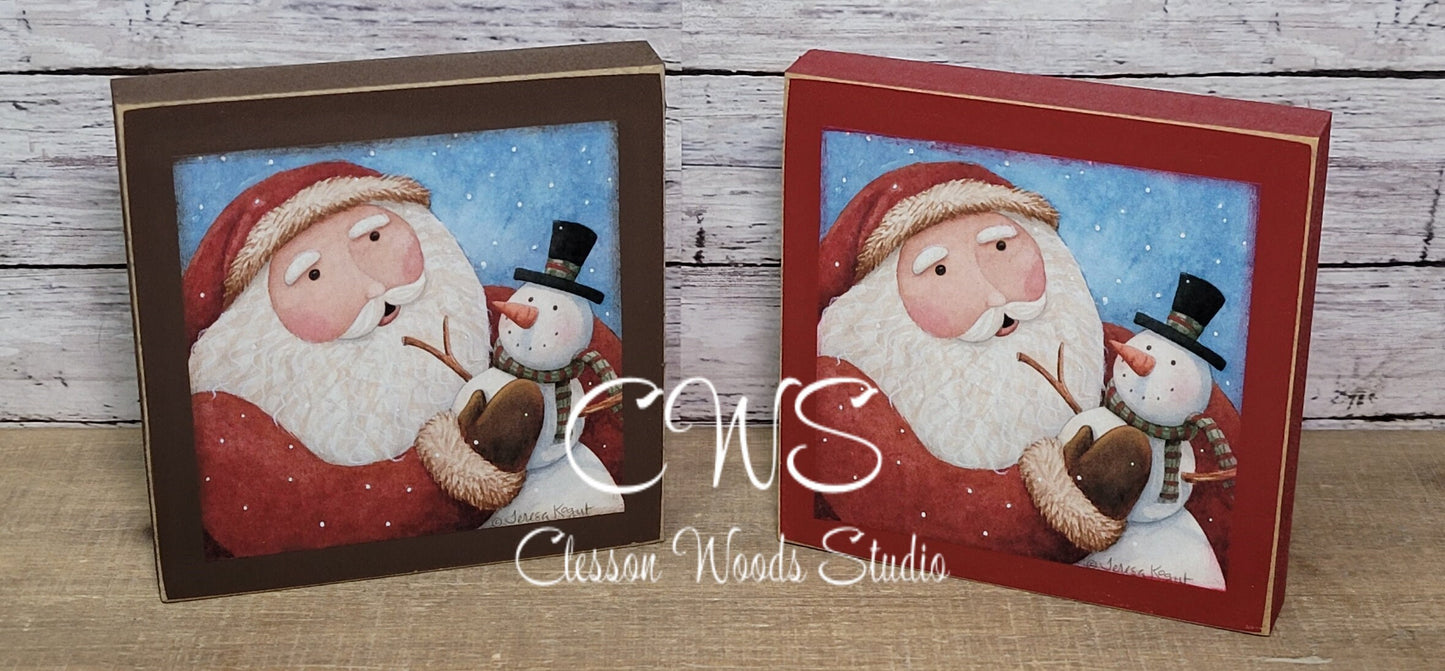 Santa Holding Snowman Square Wood Sign