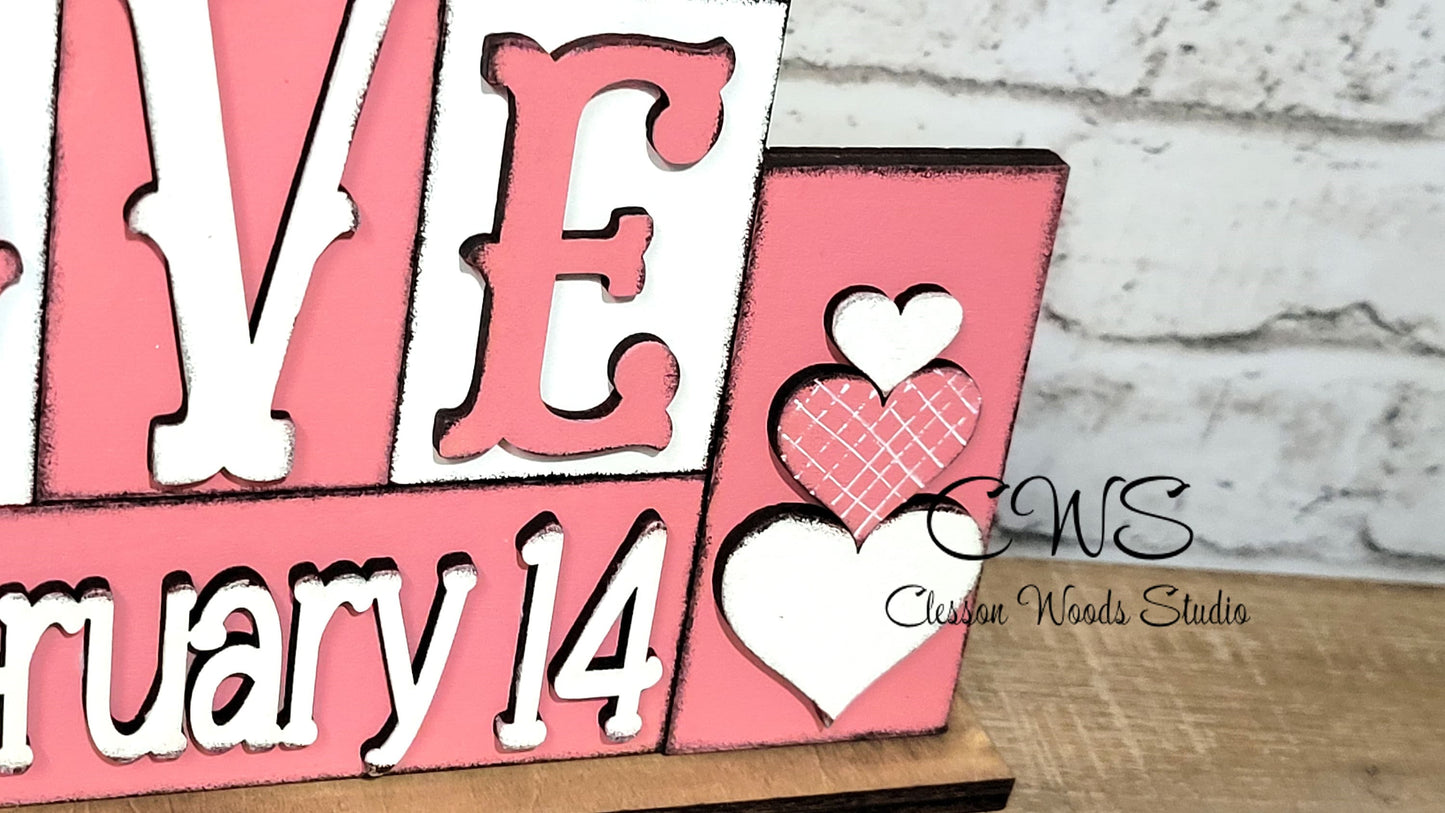 Love February 14 Pink and White Word Block Sign