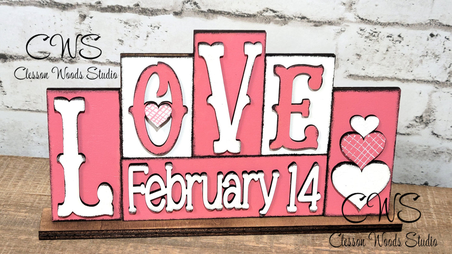 Love February 14 Pink and White Word Block Sign