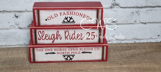 Old Fashioned Sleigh Rides 25 Cents Red Wood Block Stack