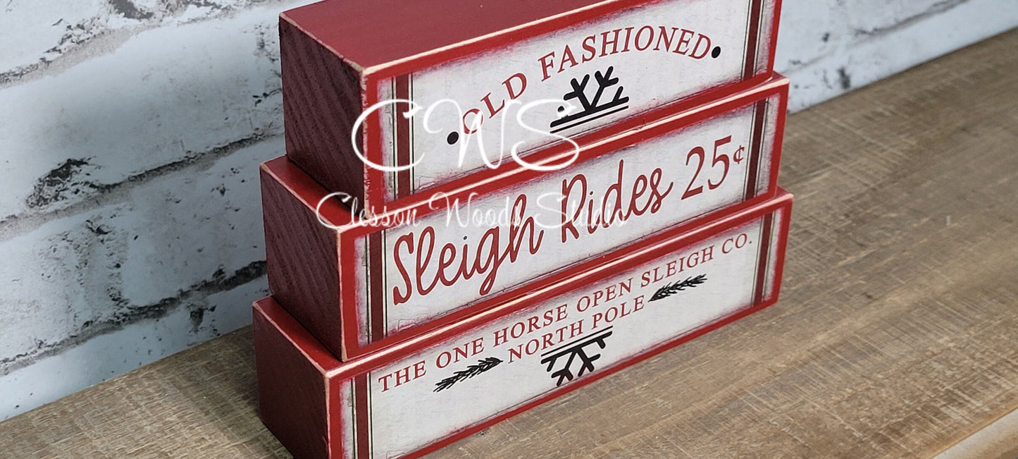 Old Fashioned Sleigh Rides 25 Cents Red Wood Block Stack