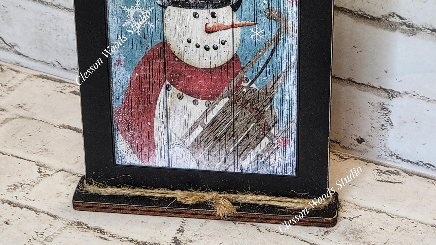 Primitive Snowman Sleigh Bells Ring Framed Art with Attached Stand