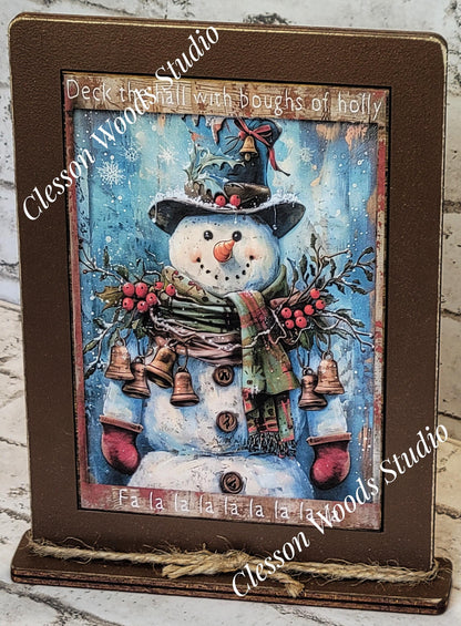 Primitive Snowman Deck The Halls Wreath and Bells Framed Art with Attached Stand