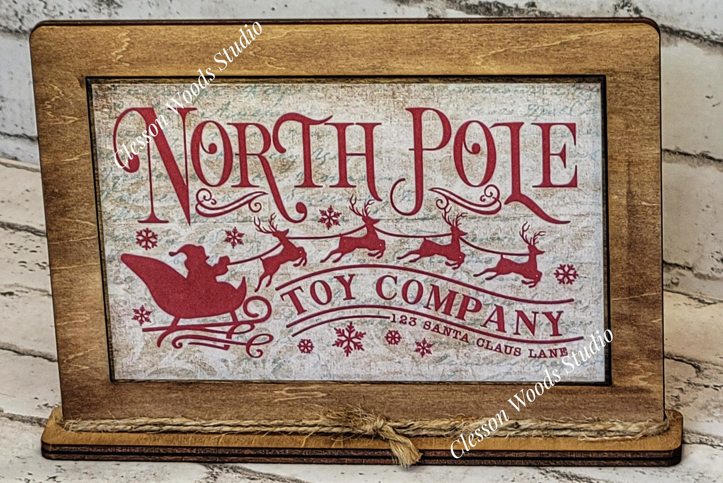 North Pole Toy Company Framed Art with Attached Stand