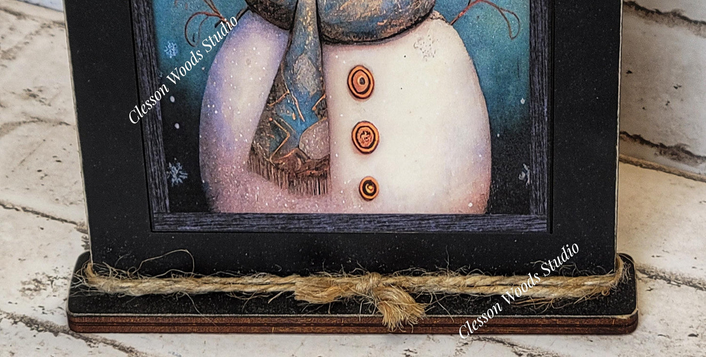 Primitive Snowman Blue Background Framed Art with Attached Stand