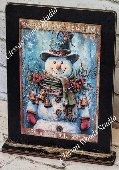 Primitive Snowman Deck The Halls Wreath and Bells Framed Art with Attached Stand