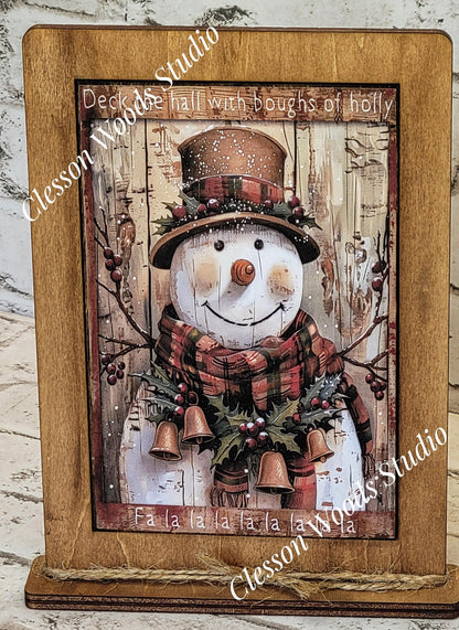 Primitive Snowman Deck The Halls Plaid Scarf Framed Art with Attached Stand